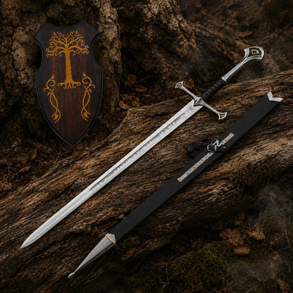 Anduril sword, black scabbard and wooden Tree motif wall plaque displayed together across textured woodland logs