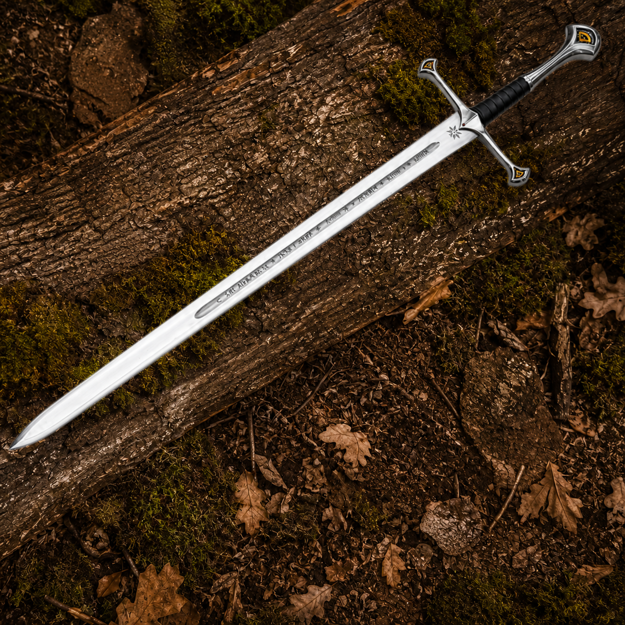 Full-length Anduril fantasy sword displayed diagonally across a mossy woodland log with engraved blade details visible