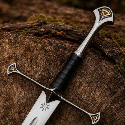 Close-up of Anduril sword hilt showing black wrapped grip, curved silver guard, pommel and gold accent details