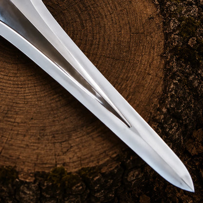 Detailed view of the polished silver Power Sword blade, raised centre accent and rounded blade tip
