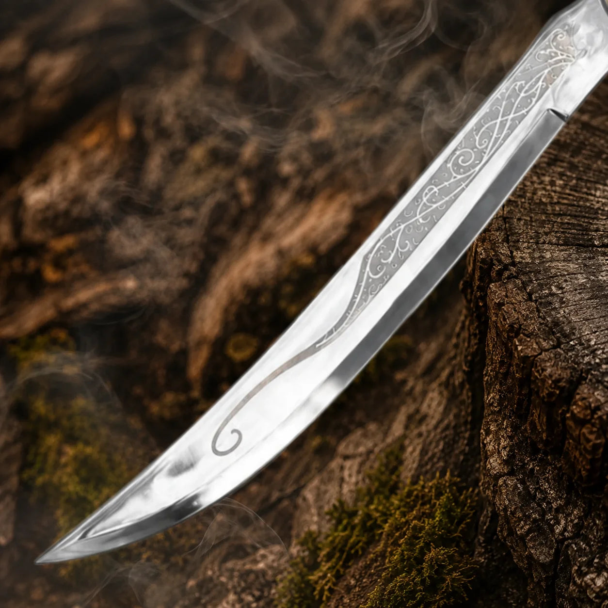 Close-up of the Legolas dagger replica blade showing engraved elven detailing and curved tip in a cinematic woodland setting