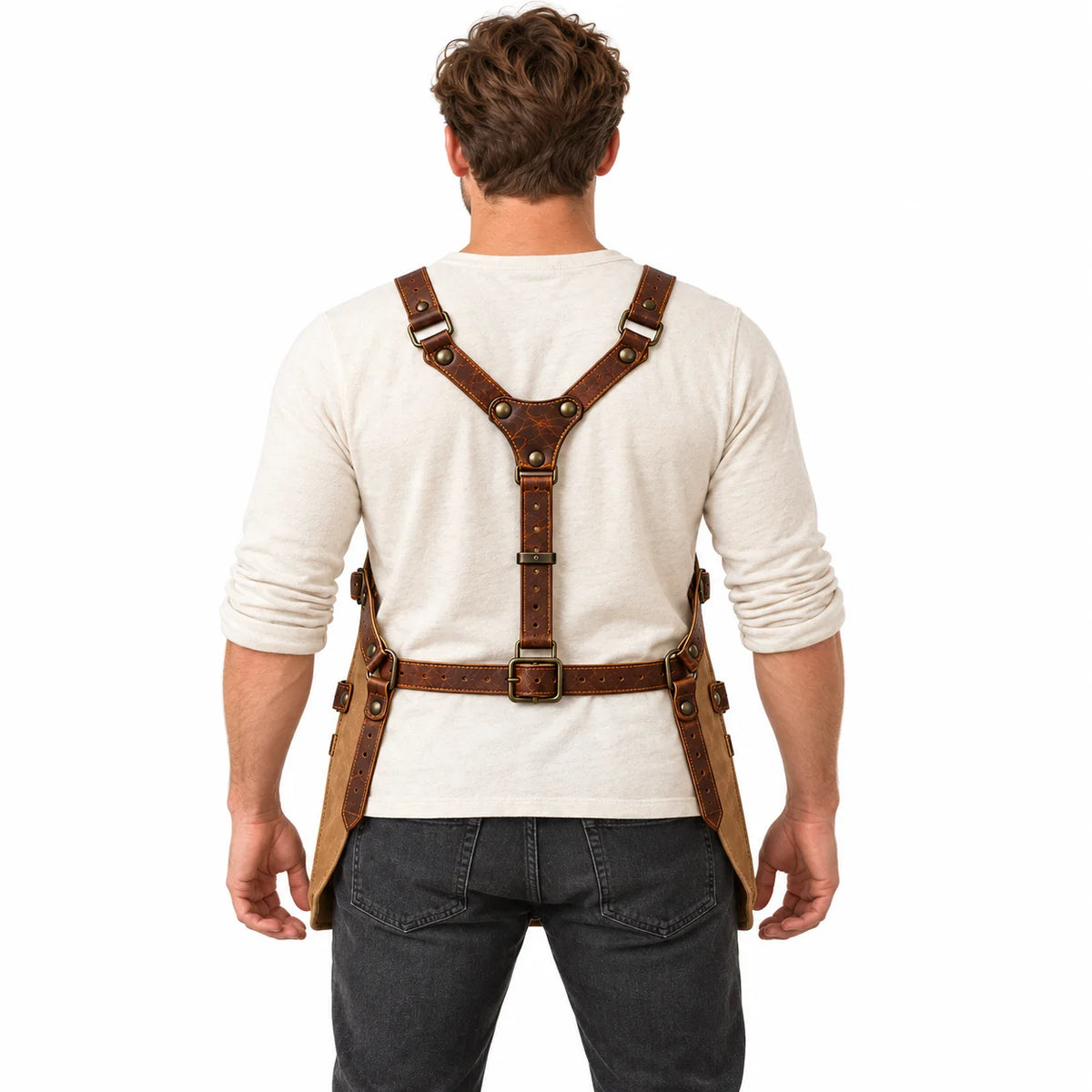 Back view of male model demonstrating the brown Y-back leather harness, adjustable waist buckle and side straps of the apron.