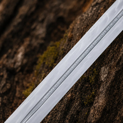 Close-up of the Peter Pevensie Rhindon Sword blade showing decorative inscription engraved along the central fuller
