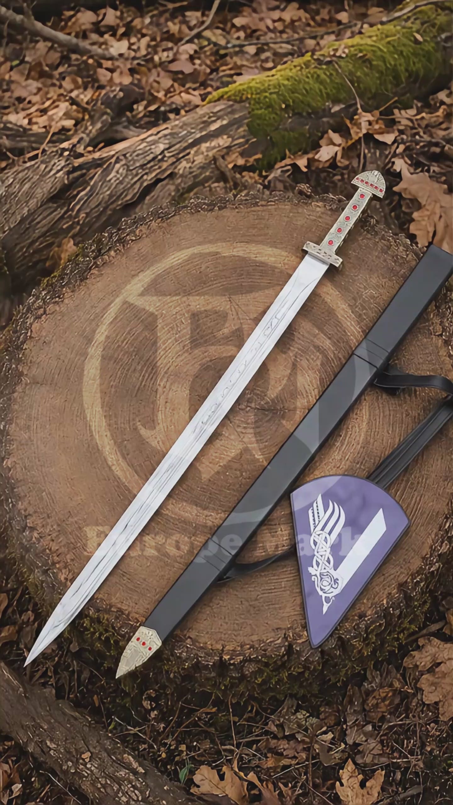 Product showcase video featuring the Ragnar Lothbrok Viking sword replica, engraved stainless steel blade, red jewel handle, black scabbard and Viking wall plaque