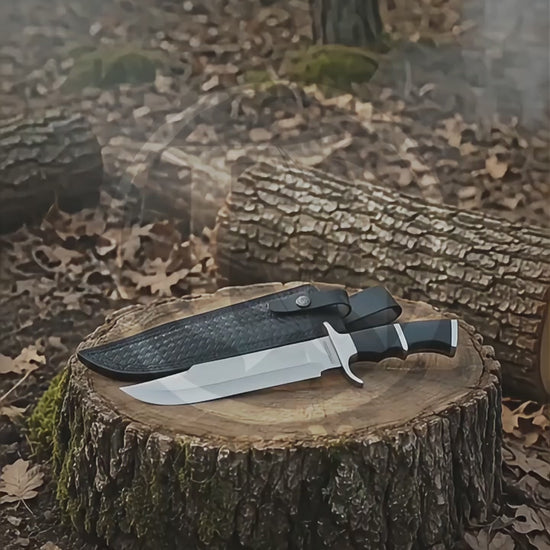 Product showcase video featuring the Predator 1987 Dutch Schaefer movie prop collectible, polished metal blade, sculpted black handle and patterned black display sheath