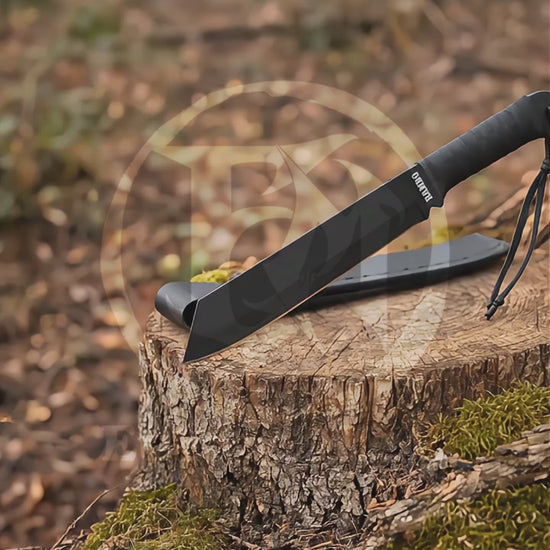Product showcase video featuring the Rambo IV movie prop collectible with matte black decorative blade, wrapped handle, wrist straps and stitched black display sheath