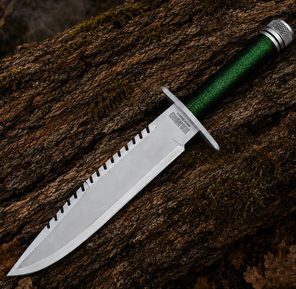 Full view of the Rambo First Blood Part I movie prop replica featuring a silver blade and dark green wrapped grip