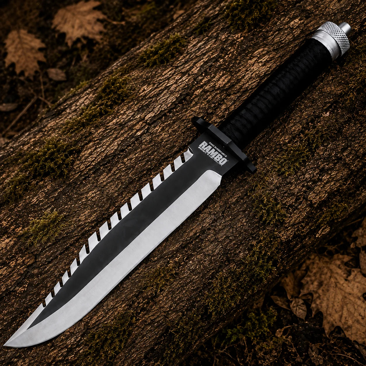 Full view of the Rambo First Blood Part II knife with black sawback blade and cord-wrapped handle