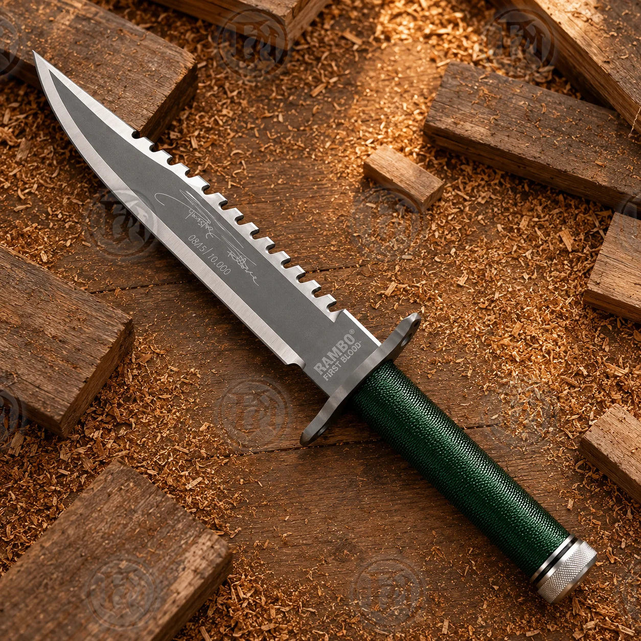 Close-up of Rambo First Blood sawback blade showing signature-style artwork, numbered marking and polished edge.