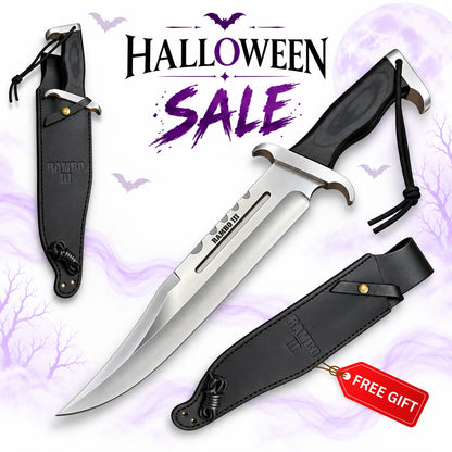 Rambo III movie survival Bowie knife replica with polished silver blade, black contoured handle, silver guard and black leather sheath in Halloween sale.