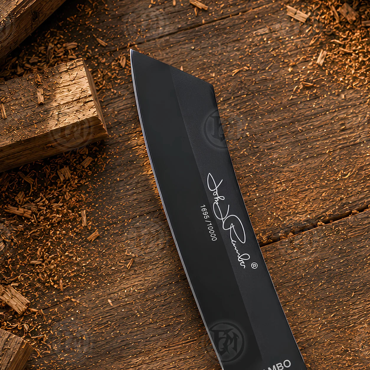 Close-up of the Rambo IV black blade displaying signature-style marking and individually numbered 1695/10000 detail.