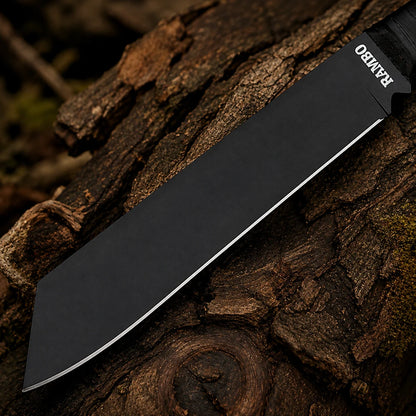 Close-up of the matte black Rambo IV decorative blade showing its broad profile and contrasting silver edge detail