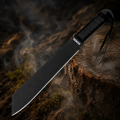 Full-length Rambo IV movie prop featuring a matte black blade, contrasting silver edge detail and black wrapped handle