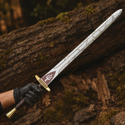 Black-gloved hand presenting the Riptide Anaklusmos sword with geometric blade engravings, gold guard and brown wrapped handle